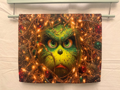 Christmas Green face peeking Through lights hand towel