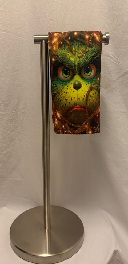 Christmas Green face peeking Through lights hand towel
