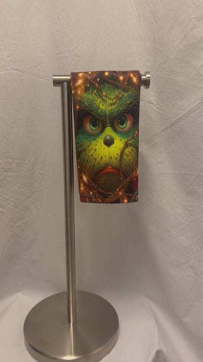 Christmas Green face peeking Through lights hand towel